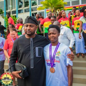 Hon. Vincent Ekow Assafuah poses with the Black Queens captain, a proud Pankrono native, following their historic WAFCON 2024 bronze medal win.